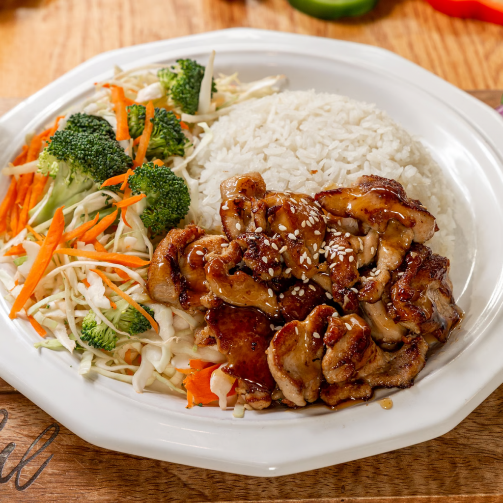 Lunch break with deliciously prepared hibachi chicken with rice and veggies